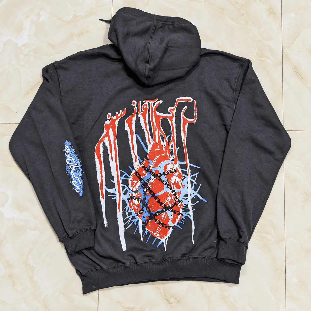 Charcoal black custom streetwear hoodie back print with barbed wire heart graphic